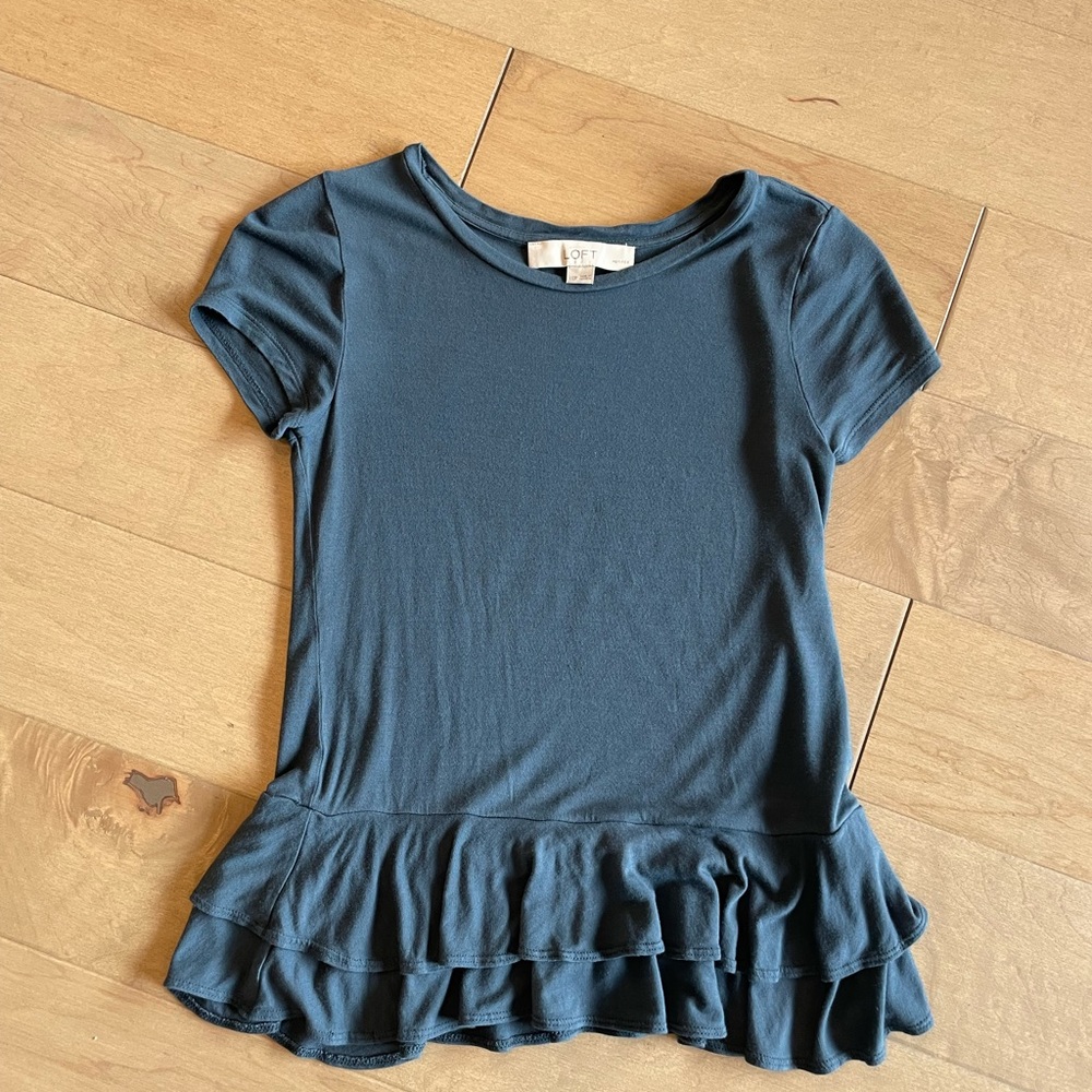 Silky soft ruffle bottom T